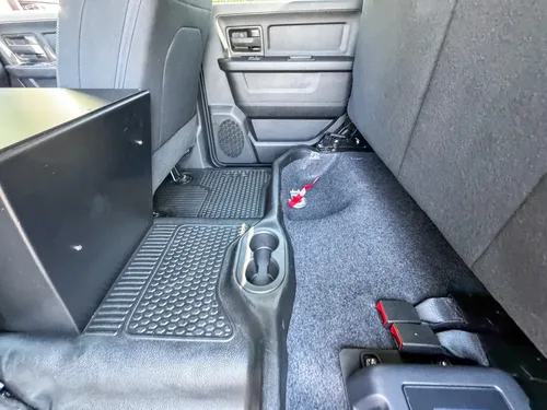 Rear door open exterior view showing access to crew-cab seating.